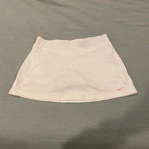 Nike tennis skirt with pink nike symbol